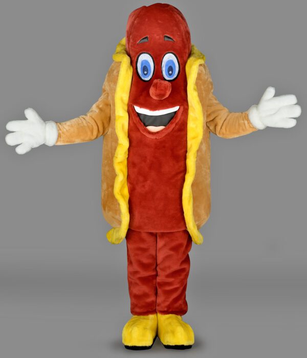 Notre mascotte “Hot Dog” affiche un grand sourire engageant et une allure conviviale, avec ses couleurs chaudes et appétissantes : pain doré, saucisse rouge-orange et moutarde jaune.